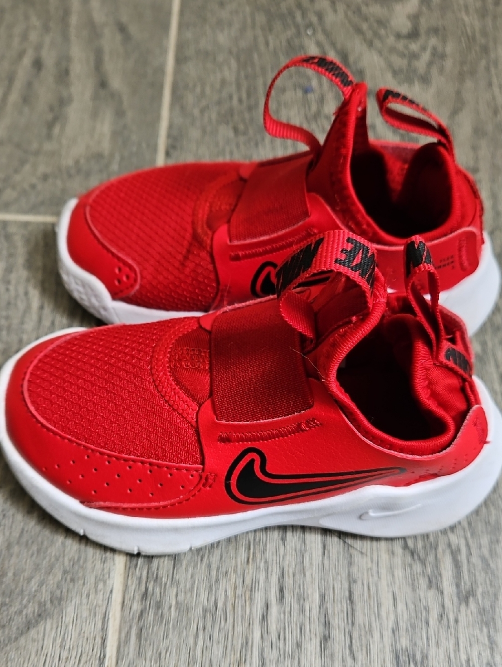 Nike Red Kids' Slip-On Athletic Sneakers with Black Swoosh